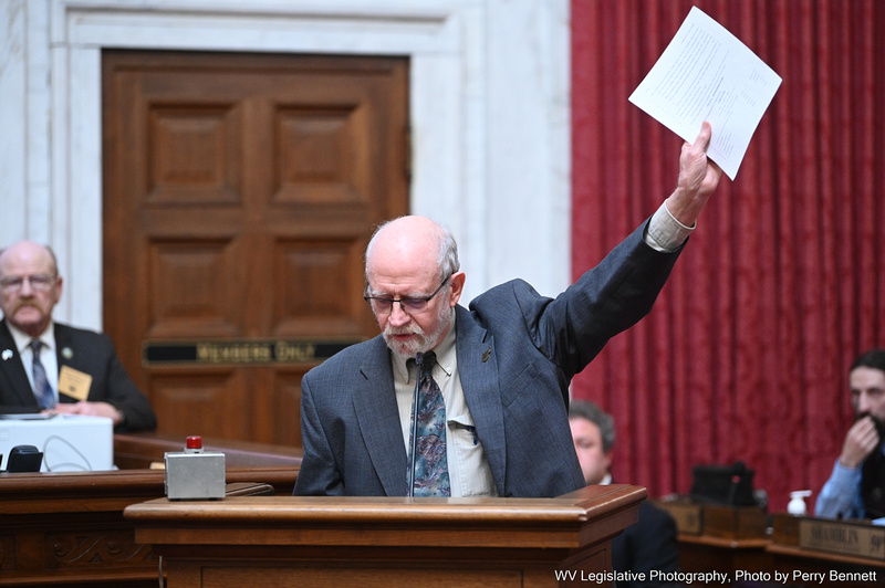 West Virginia Citizen Action Group Executive Director Gary Zuckett holds up a copy of the single-page HB 2883, which would give $500 million in unallocated COVID-19 relief funding to the West Virginia Economic Development Authority. The proposed bill drew ire Thursday from West Virginians who believe the money should go to help the areas hit hardest by the pandemic. - PERRY BENNETT | WV Legislative Photography wvgazettemail.com